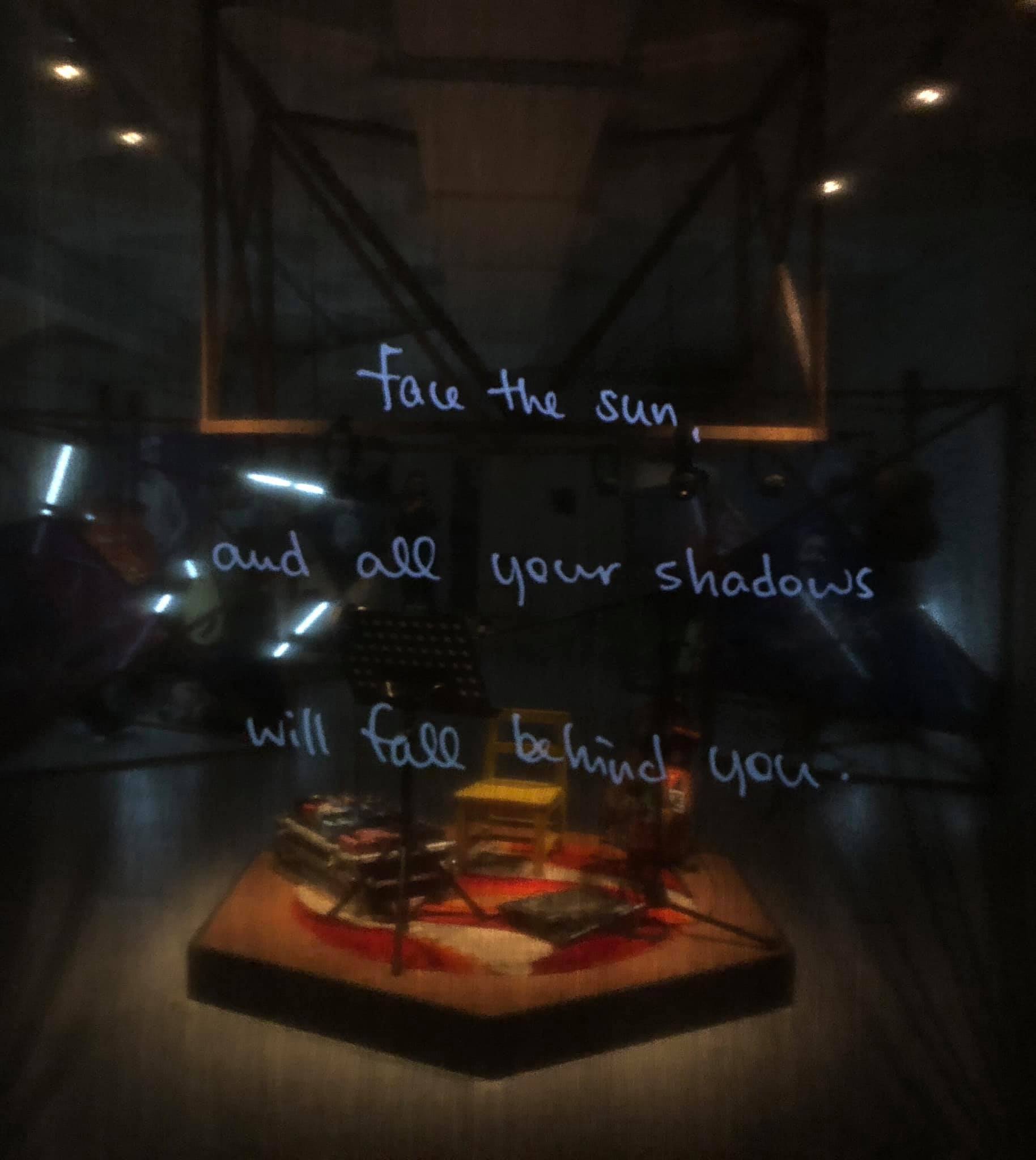 face the sun and all your shadows will fall behind you